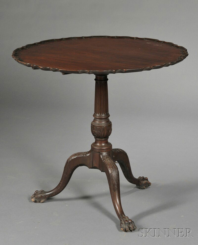 Georgian Mahogany Tilt-top Piecrust Table, England: Georgian Mahogany Tilt-top Piecrust Table, England, 18th/19th century, on fluted and acanthus-carved columnar standard, with tripod base ending in paw feet, ht. 29 3/4 in.