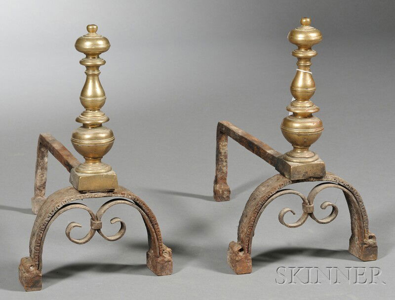 Pair of Brass and Iron Andirons, of typical form,: Pair of Brass and Iron Andirons, of typical form, baluster-shaped on two legs, ht. 15 1/2 in.
