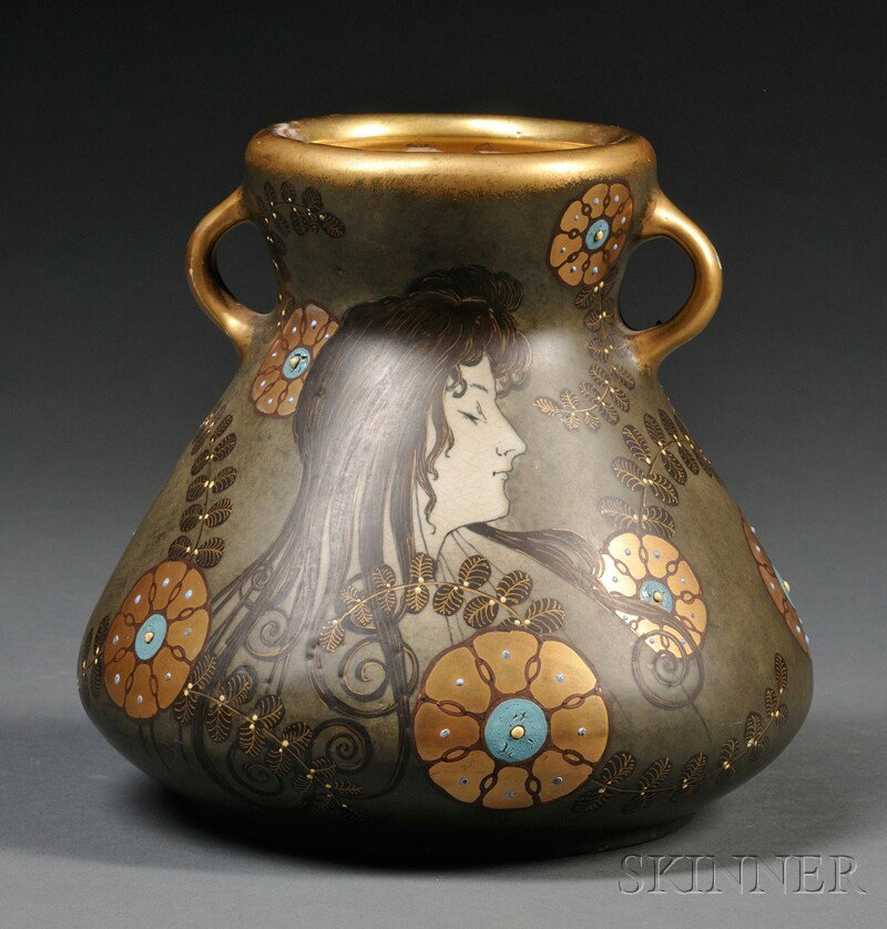 Zsolnay-type Art Nouveau Ceramic Vase, c. 1900, wi: Zsolnay-type Art Nouveau Ceramic Vase, c. 1900, with squat tapered body and two handles, decorated with a raven-haired beauty in profile among gilded and polychrome enameled flowerheads and leaf frond