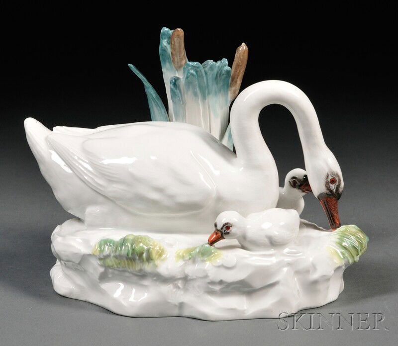 Meissen Porcelain Swan Group, Dresden, 20th centur: Meissen Porcelain Swan Group, Dresden, 20th century, an adult bird and two hatchlings backed by reeds, with first quality crossed swords mark, approx. lg. 8 in.
