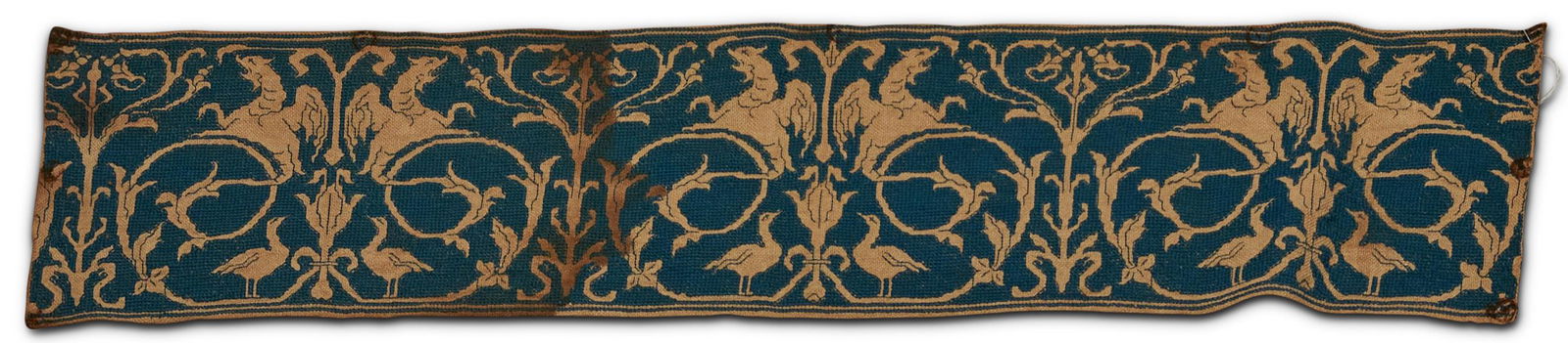 Blue Embroidery Panel with Ducks and Griffins Spain or Italy 6 in. x 2 ft. 2 in.: Blue Embroidery Panel with Ducks and Griffins Spain or Italy c. 17th century. 6 in. x 2 ft. 2 in.