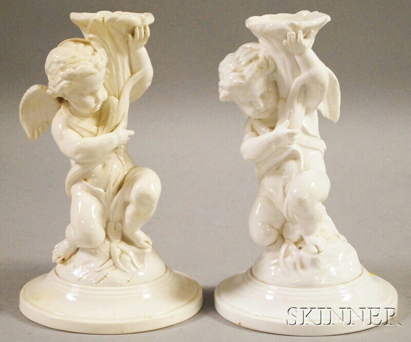 Pair of Copeland Creamware Cupid Figures, undergla: Pair of Copeland Creamware Cupid Figures, underglazed mark to base, impressed mark to back, (cracks, chips), ht. 10 1/4 in.