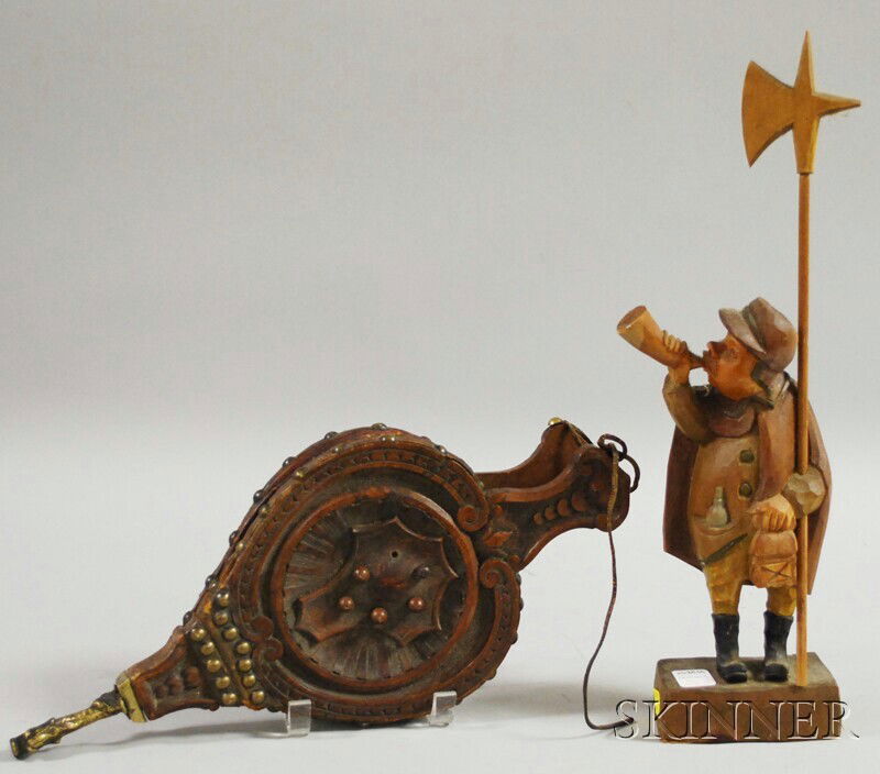 Two Black Forest Carved Wooden Articles, a firepla: Two Black Forest Carved Wooden Articles, a fireplace bellows and a figure of a man with horn and axe, ht. 17 in.