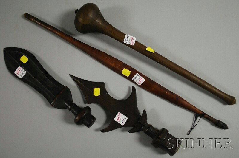 Four Weapons, two African knives, a knobkerrie, an: Four Weapons, two African knives, a knobkerrie, and a New Guinean spear thrower.