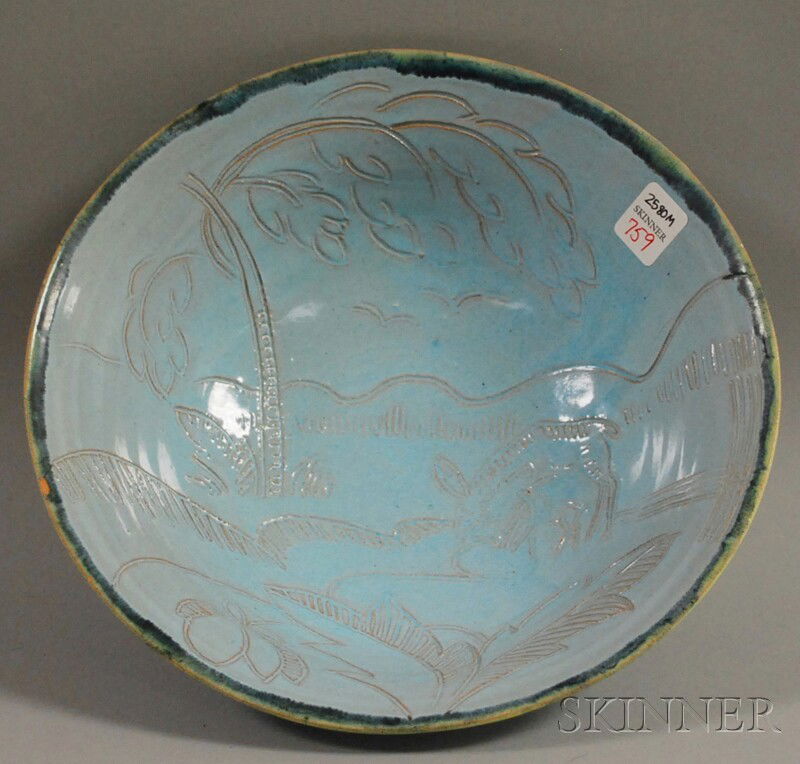 Jark Zan Studio Art Pottery Bowl, Canada, 1947, in: Jark Zan Studio Art Pottery Bowl, Canada, 1947, incised decoration of deer in a landscape in pale blue glaze, with inscription on reverse, signed and dated, ht. 3 5/8, dia. 10 3/4 in.