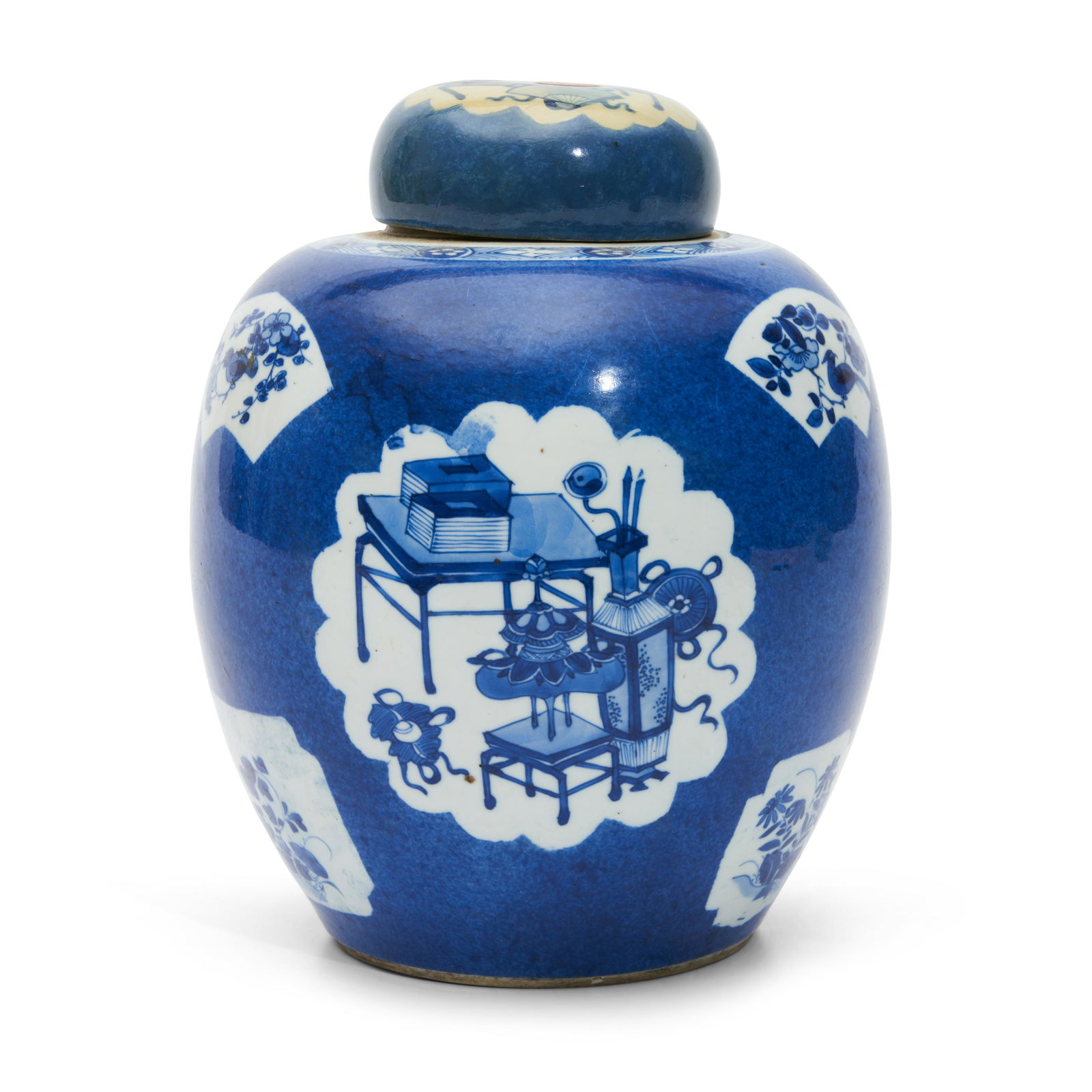 Blue and White Powder Blue-ground Covered Jar: Blue and White Powder Blue-ground Covered Jar China, possibly Kangxi period, with bulbous shoulder and bisque mouth and foot rims, decorated with, 'hundred treasures,' and floral designs in variously