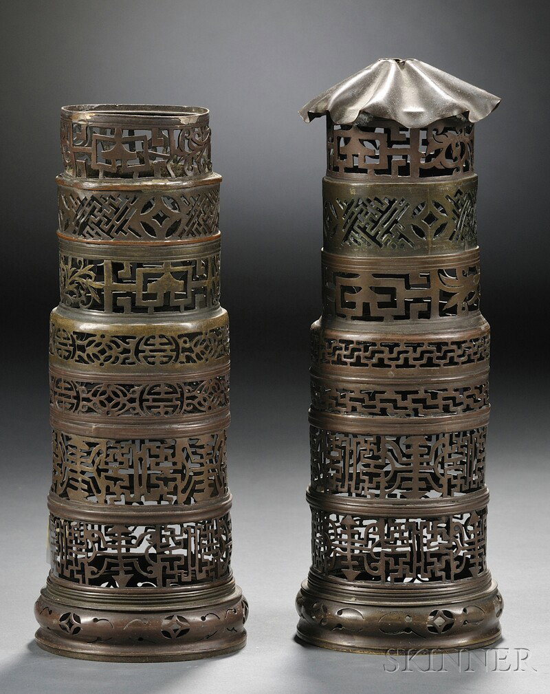 Pair of Bronze Incense Clocks, China, each tiered i: Pair of Bronze Incense Clocks, China, each tiered incense burners with reticulated design, (one missing the lid), ht. 8 3/8 in.