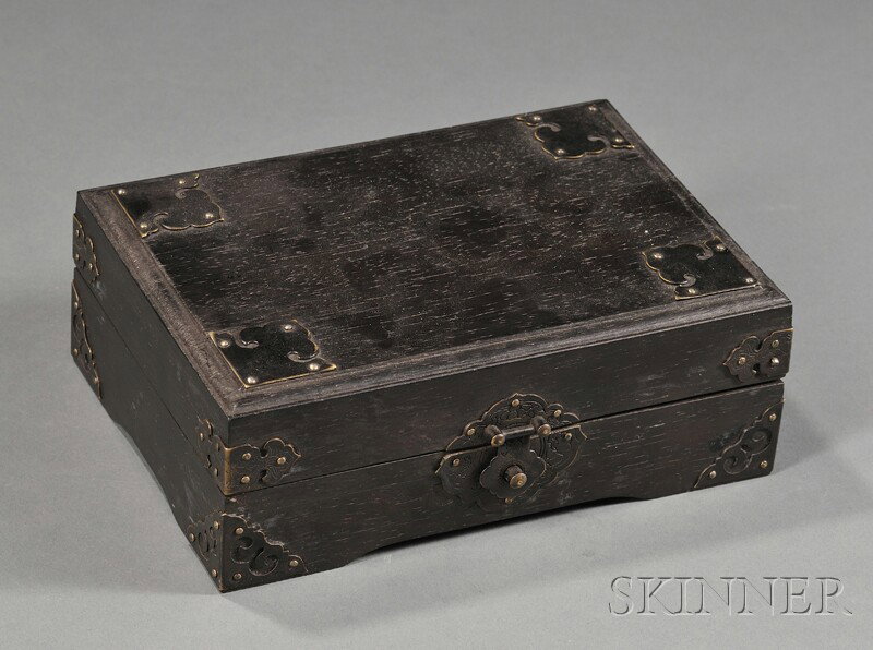 Wood Box, China, rectangular shape with metal hard: in good conditionWood Box, China, rectangular shape with metal hardware and rose colored silk lining, lg. 7 5/8 in.