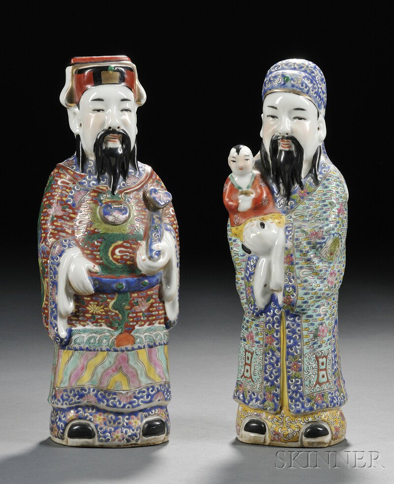 Pair of Porcelain Figures, China, standing figures: Pair of Porcelain Figures, China, standing figures of two officials, one holding a child, the other holding a Ruyi scepter, with enameled robes, ht. 11 3/4 in.