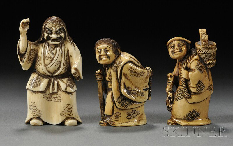 Three Netsuke, Japan, Kyogen actor with demon mask: Three Netsuke, Japan, Kyogen actor with demon mask, and two pilgrims, ht. to 2 1/2 in.