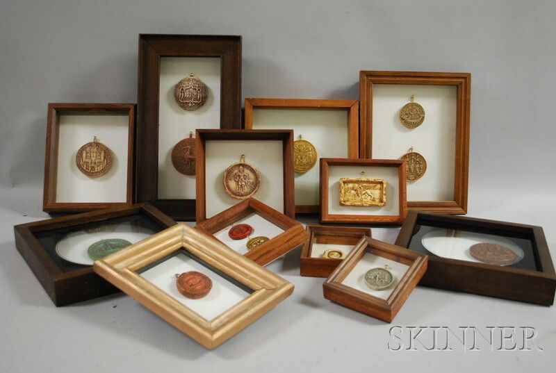 Twelve Frames Containing Fifteen Wax Seals Depict: Twelve Frames Containing Fifteen Wax Seals Depicting Various Medieval Subjects, some with Latin inscriptions.