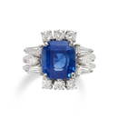 A SAPPHIRE AND DIAMOND RING