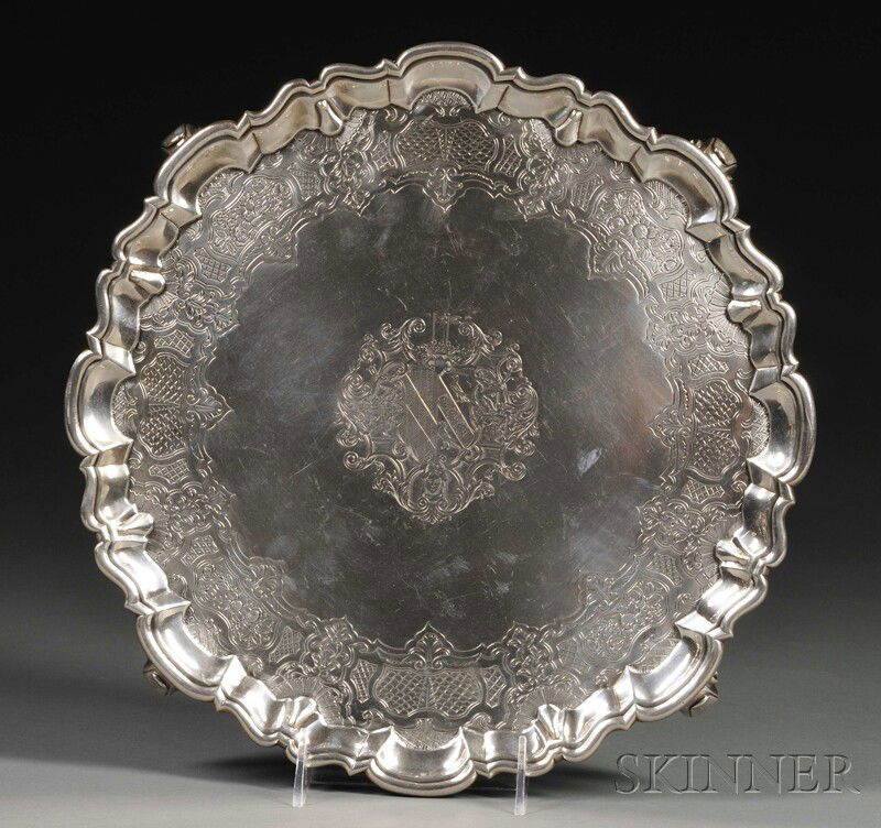 George II Silver Salver, London, 1745, Robert Abercr: George II Silver Salver, London, 1745, Robert Abercromby, maker, with molded edge, engraved coat of arms to center and stylized strapwork and foliate engraving around outer edge, on four scroll feet,