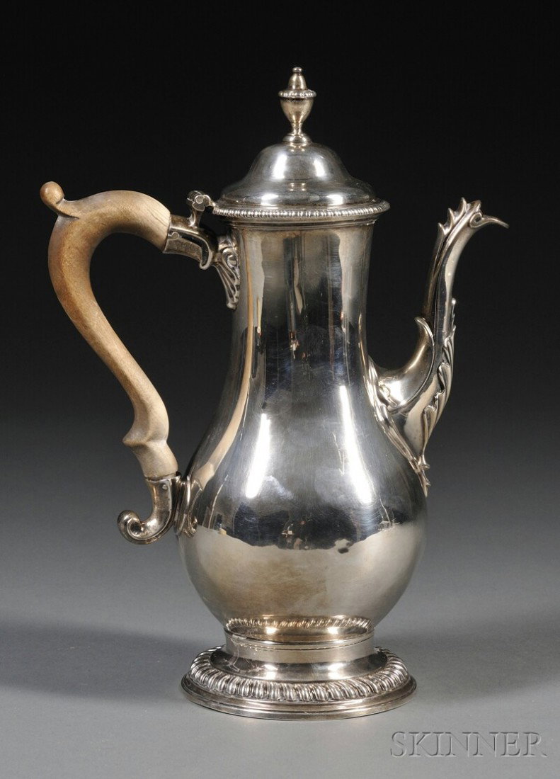 George III Silver Coffeepot, London, 1777, Charles: George III Silver Coffeepot, London, 1777, Charles Wright, maker, baluster-form body with gadrooned lid rim and base, foliate-decorated spout, acorn-form finial, and carved wood handle, with engraved 