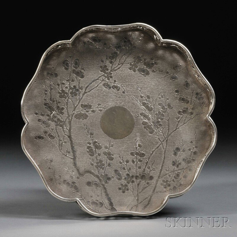 Chinese Export Silver Footed Tray, Wang Hing, late: Chinese Export Silver Footed Tray, Wang Hing, late 19th century, flower shaped with an openwork gallery of dragons, prunus center to a dimpled ground, mounted atop three fluted ball feet, WH and chara