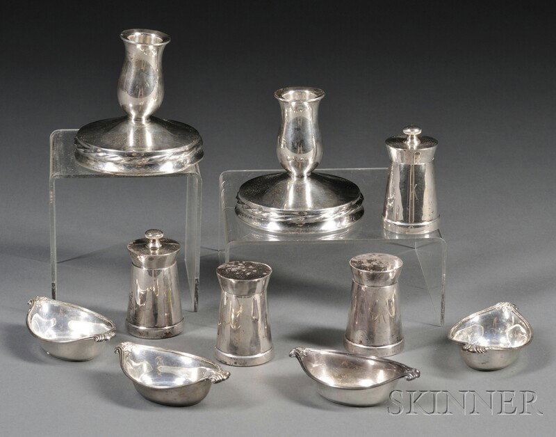 Ten Small Silver Table Articles, a set of four Dom: Ten Small Silver Table Articles, a set of four Dominick & Haff scroll-edged sterling nut dishes, a pair of Towle weighted sterling candleholders, and two pairs of salt and pepper shakers and mills, on