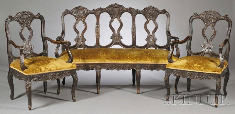 Georgian-style Victorian Carved Seating Suite, lat: Georgian-style Victorian Carved Seating Suite, late 19th century, a settee and four armchairs, each with foliate-carved crest, openwork splat, outswept arms, overupholstered seat, shell-carved seat ra