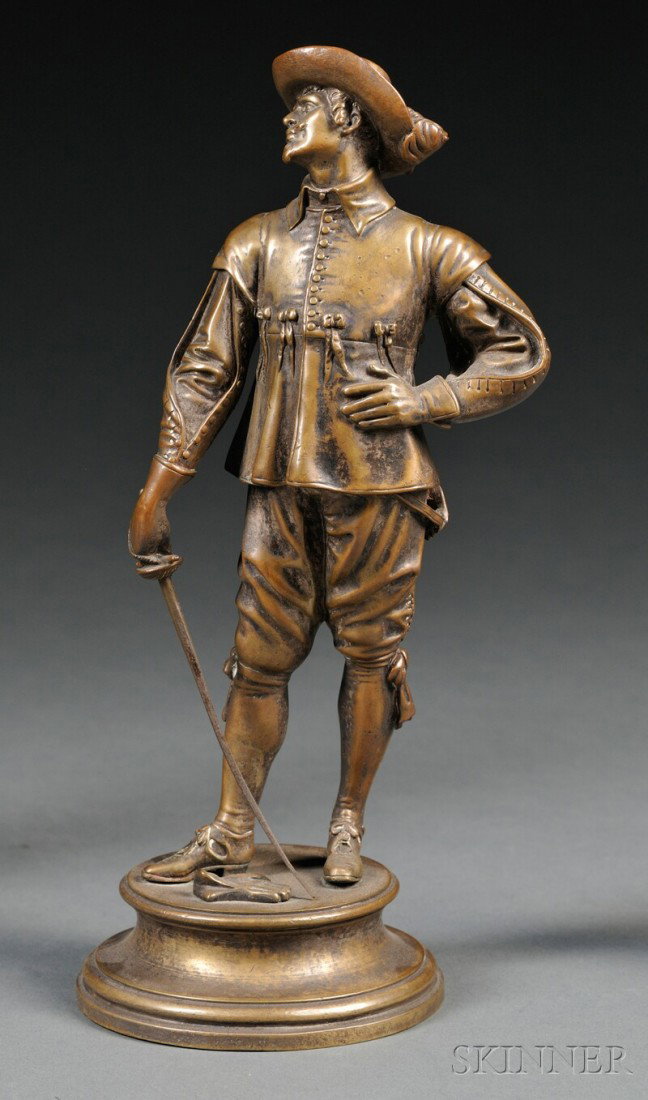 After Emile Corolian Hippo Guillemin (French, 1842: After Emile Corolian Hippo Guillemin (French, 1842-1907) Bronze Figure of a Cavalier, the standing man striking a pose, with sword drawn and a glove at his feet, on circular base signed "E. Guillemin"