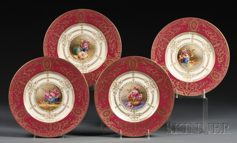 Four Royal Worcester Cabinet Plates, England, firs: Four Royal Worcester Cabinet Plates, England, first half 20th century, each with a different hand-painted floral still life signed "S. Stanley," and bordered by cream, maroon, and gilt, with factory m