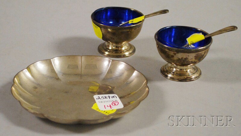 Five Small American Sterling Tableware Items, a pai: Five Small American Sterling Tableware Items, a pair of Tiffany & Co. footed open salts with cobalt glass liners, 1938-47, a pair of salt spoons retailed by Shreve, Crump & Low, and a Tiffany & Co. sc