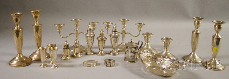 Group of Sterling Silver and Weighted Sterling Sil: Group of Sterling Silver and Weighted Sterling Silver Tableware, including four pairs of weighted candleholders, a Gorham reticulated dish, two napkin rings, a reticulated mustard pot sleeve, five wei