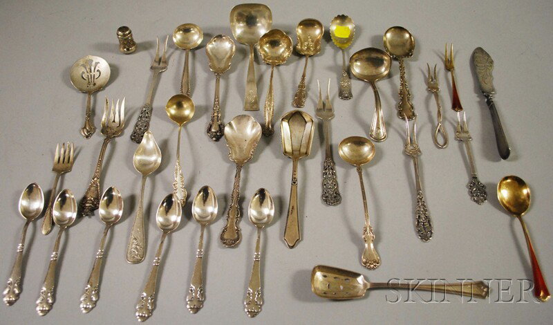 Group of Assorted Mostly Sterling Silver Spoons a: Group of Assorted Mostly Sterling Silver Spoons and Flatware Servers, approximately thirty pieces total, makers include Lunt, Gorham, Durgin, Whiting, Towle, Frank W. Smith, and some Scandinavian piec