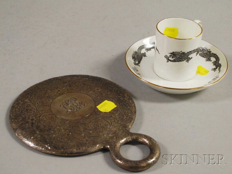 Sterling Silver-mounted Hand Mirror and a Tiffany: Sterling Silver-mounted Hand Mirror and a Tiffany & Co. Dragon-decorated Porcelain Cup and Saucer, the mirror possibly Tiffany but lacking visible marks.