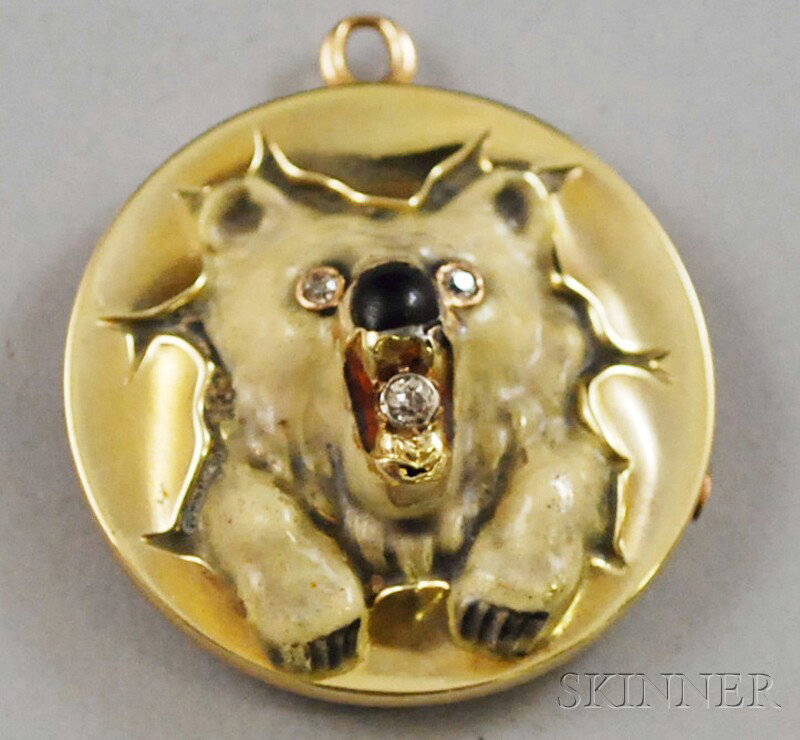 14kt Gold, Enamel, and Diamond Pendant, conceived: 14kt Gold, Enamel, and Diamond Pendant, conceived as a polar bear bursting out of a Victorian-style locket, the polychrome enamel bear with diamond eyes and a third diamond in its open mouth, monogram