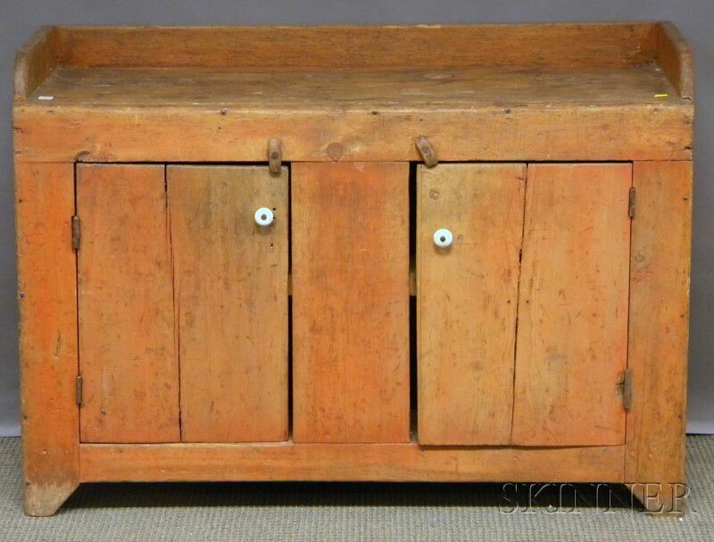 Country Orange-painted Pine Dry Sink with Two Cabi: Country Orange-painted Pine Dry Sink with Two Cabinet Doors, ht. 31, lg. 44, wd. 17, ht. to top 28 in. Provenance: Estate of Susan Parrish.
