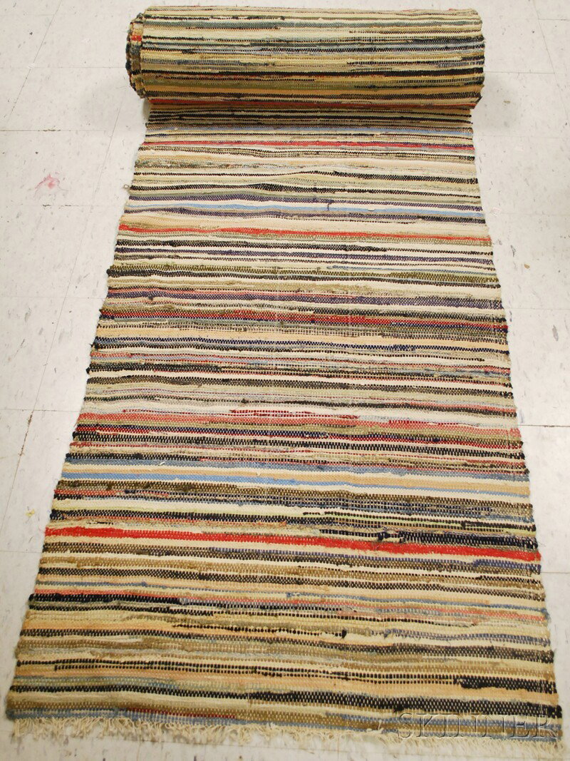 Long Woven Rag Rug, 43 ft. 3 in. x 34 in. Provena: Long Woven Rag Rug, 43 ft. 3 in. x 34 in. Provenance: Estate of Susan Parrish.