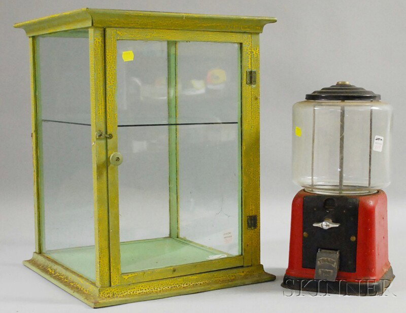 Vintage 5-cent Coin-op Countertop Gumball Machine: Vintage 5-cent Coin-op Countertop Gumball Machine and a Green over Yellow-painted Wood and Glass Countertop Display Cabinet, the cabinet with one fixed shelf, gumball machine ht. 15 1/4, cabinet ht. 1
