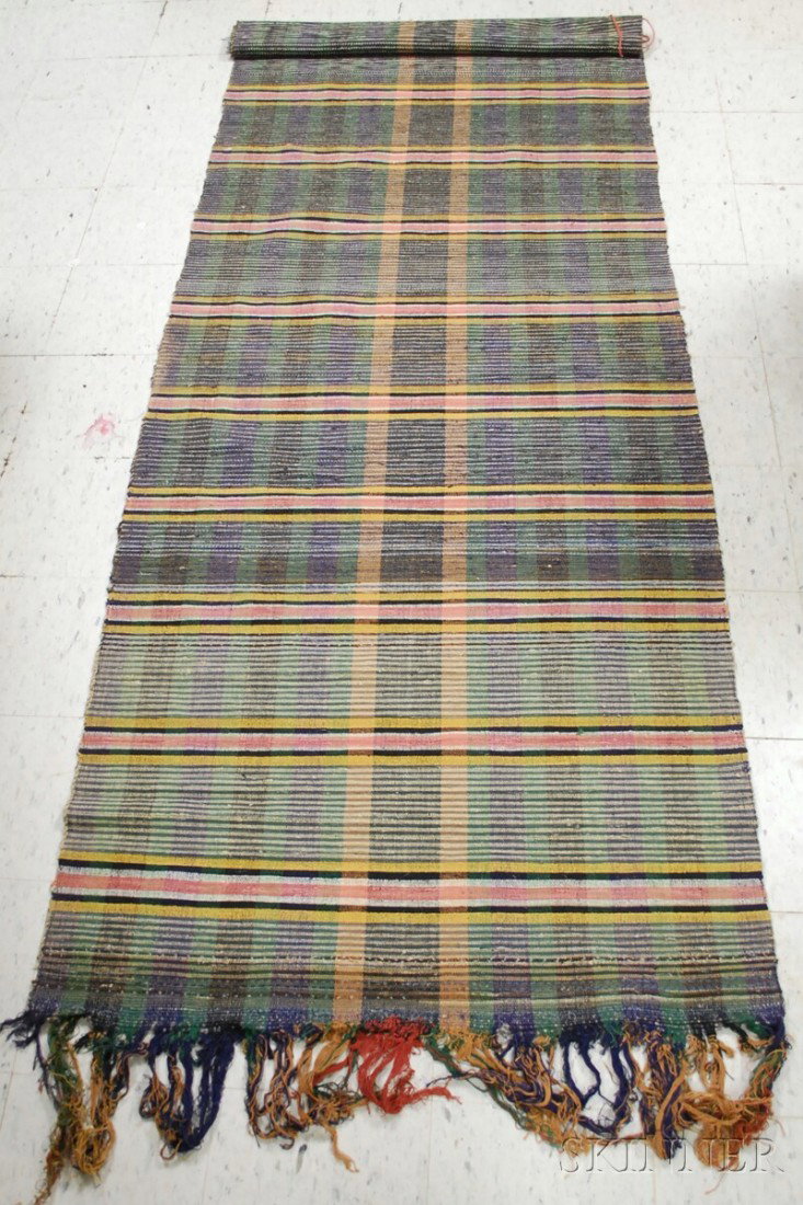 Long Woven Rag Rug, lg. 12 ft, wd. 43 in. Proven: Long Woven Rag Rug, lg. 12 ft, wd. 43 in. Provenance: Estate of Susan Parrish.