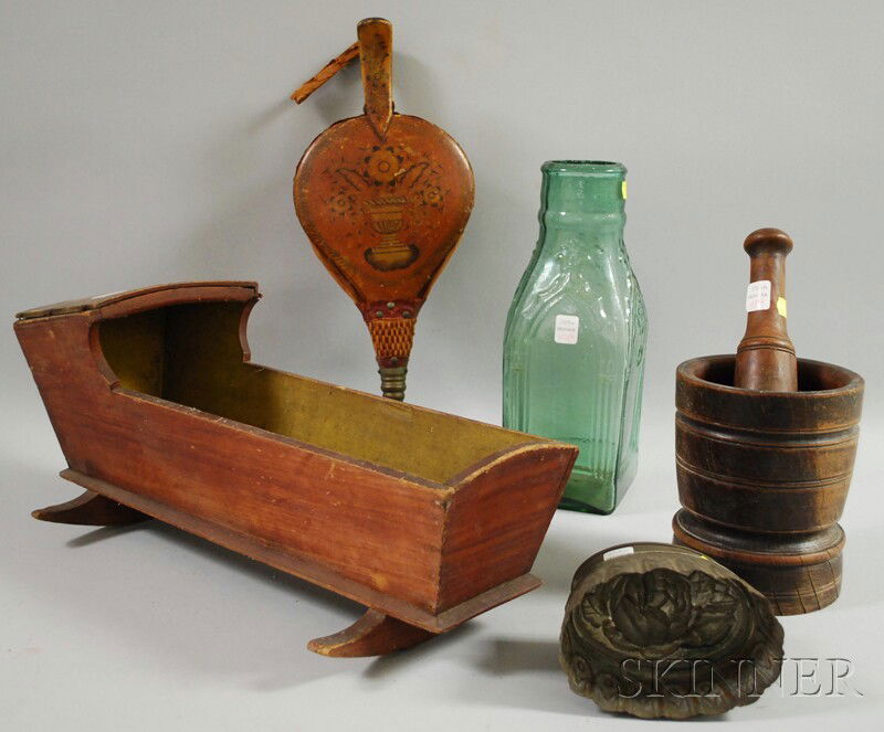Six Assorted Country Items, a large aqua molded g: Six Assorted Country Items, a large aqua molded glass cathedral pickle bottle, a painted and stenciled wood bellows, a tin culinary mold, a turned wood mortar and pestle, and a grain-painted wooden do