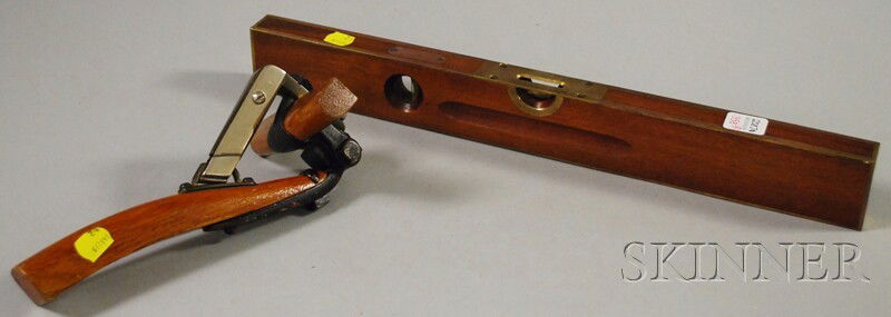 Patent Model Wood and Metal Wagon Tool and a Stan: Patent Model Wood and Metal Wagon Tool and a Stanley Mahogany and Brass Level, the tool from North Kingstown, Rhode Island.