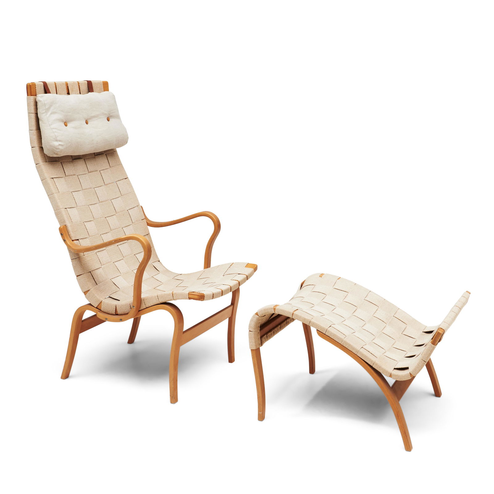 Bruno Mathsson-style Chair and Ottoman,: Bruno Mathsson-style Chair and Ottoman, c. 1970, beechwood, upholstery, paper label "Scandinavian Design 127 East 59th Street, New York, New York," chair, ht. 43, seat ht. 16 1/4, 23 1/2, dp. 25, otto