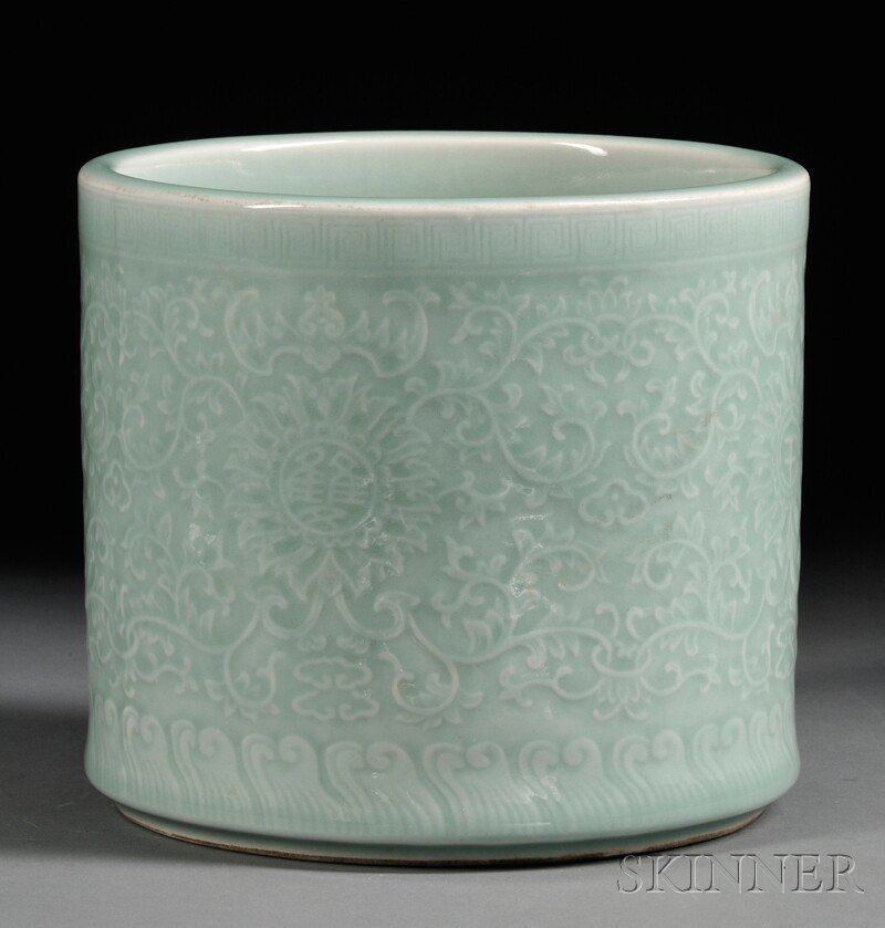 Celadon Glaze Brush Pot, China, 20th century, cylindric: Celadon Glaze Brush Pot, China, 20th century, cylindrical, decorated with continuous underglaze design of scrolling lotus and tendrils, bats, ruyi heads, and shou characters, a stylized wave border at