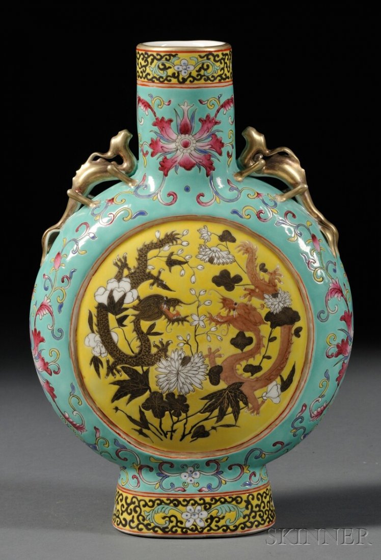 Famille Rose Moon Flask, China, late 19th century, deco: Famille Rose Moon Flask, China, late 19th century, decorated with flowers and dragons in yellow roundels, reserved on a turquoise floral ground, lizard handles to shoulders, ht. 12 in.