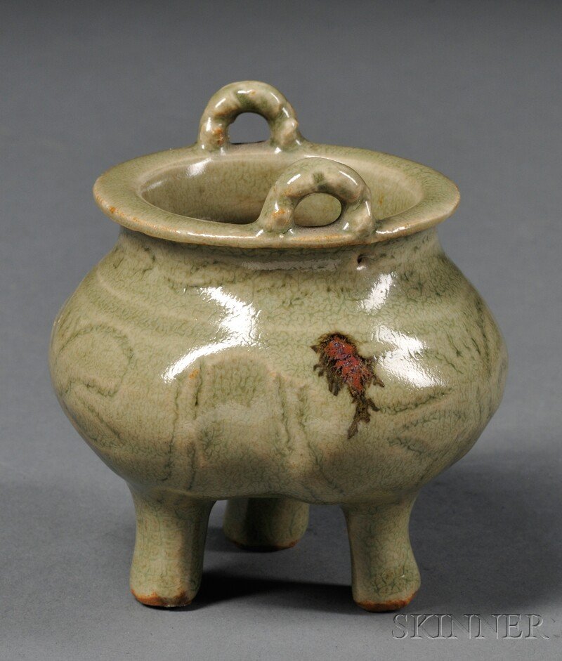 Lung-ch'uan Celadon Censer, China, 20th century, tripod: Lung-ch'uan Celadon Censer, China, 20th century, tripod shape with ring handles and incised decoration of lotus on the body, dia. 2 5/8 in. Provenance: Babson College Sorenson Center for the Arts, Wel