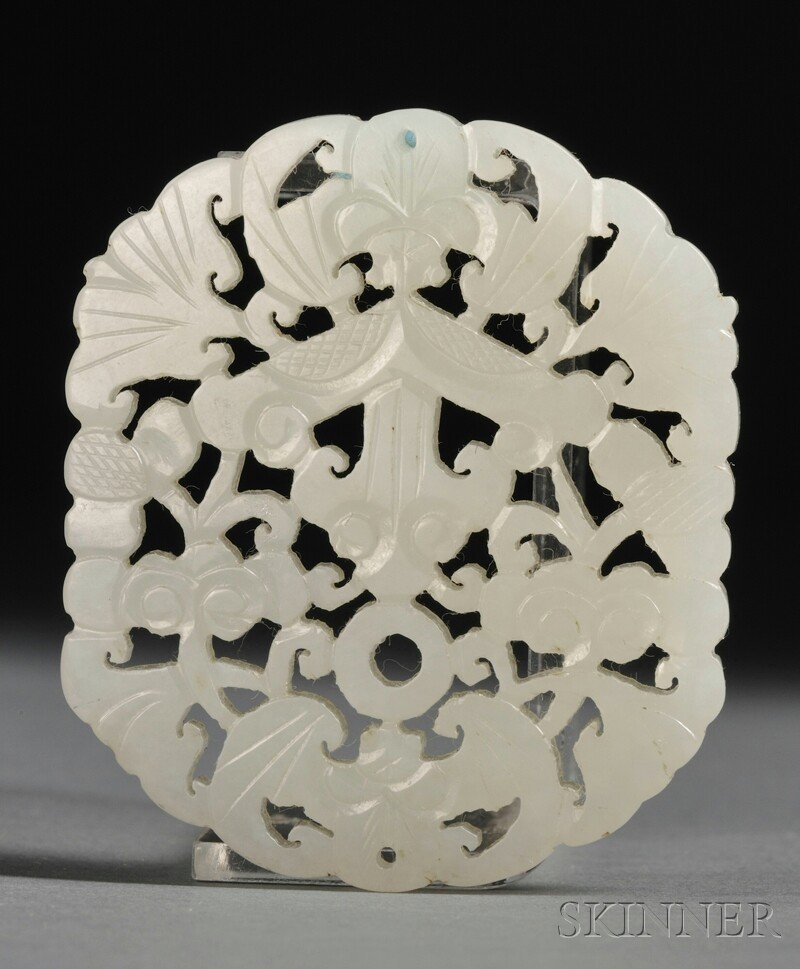 Circular Openwork Jade Plaque, China, depicting a group: Circular Openwork Jade Plaque, China, depicting a group of bats, stone of pale celadon color, lg. 2 in.