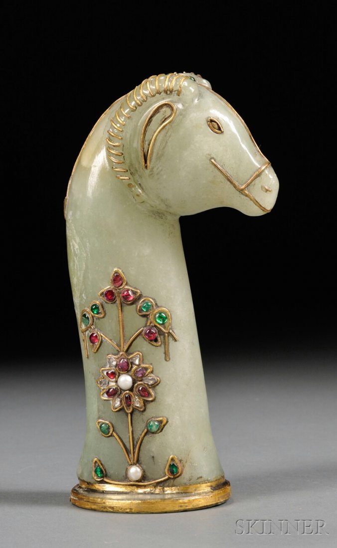 Jade Sword Handle, China, Mughal-style, depicting the h: Jade Sword Handle, China, Mughal-style, depicting the head of a ram, with ruby, rough diamond, emerald, and pearl inlays, with gilt trim, ht. 6 1/2 in.