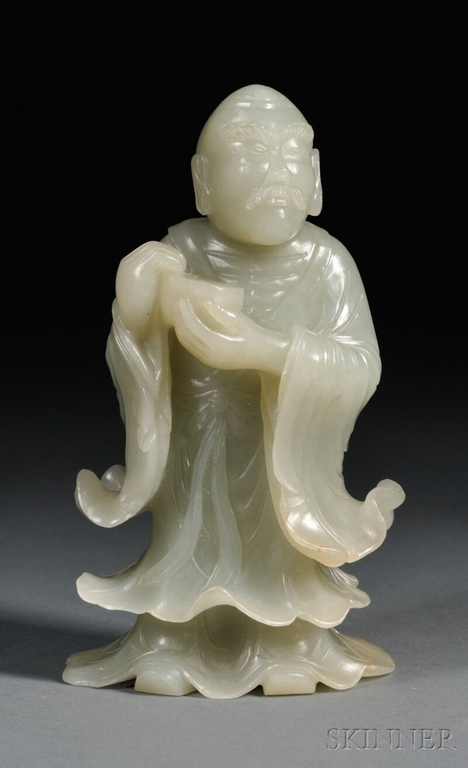 Jade Carving, China, depicting a sage holding a bowl wi: Jade Carving, China, depicting a sage holding a bowl with both hands, wearing a flowing robe, stone of pale greenish-gray color, ht. 5 1/2 in.