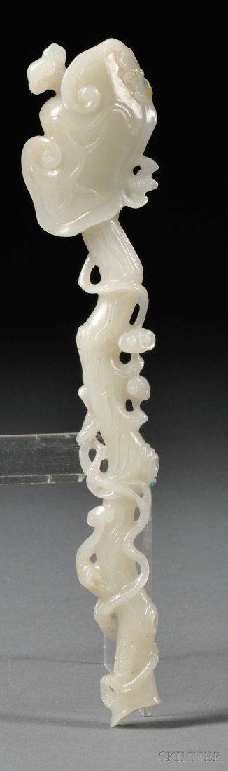 Jade Scepter, China, depicting a lingzhi branch, surmou: Jade Scepter, China, depicting a lingzhi branch, surmounted with two small bats at the edge of terminal, stone of pale-celadon color with minor russet markings, lg. 8 3/4 in.