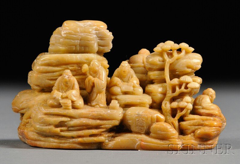 Soapstone Carving, China, depicting scholars and Immort: Soapstone Carving, China, depicting scholars and Immortals in a landscape with pine trees, stone of pale yellow color with some russet markings, lg. 4 in.