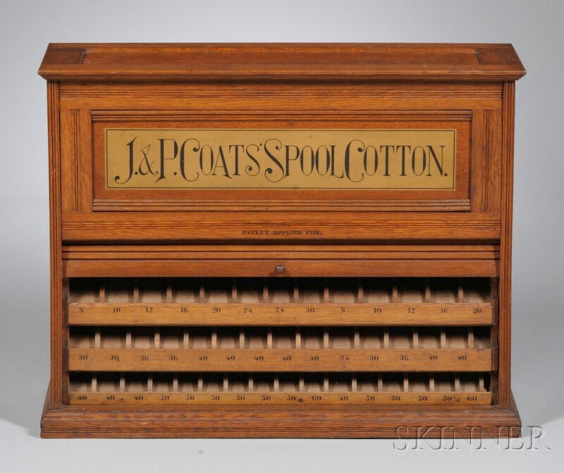 "J. & P. Coats' Spool Cotton" Oak Tambour Roll-fro: "J. & P. Coats' Spool Cotton" Oak Tambour Roll-front Retail Countertop Cabinet, c. 1900, painted front and back labels, lift-top with numbered drop-slot fitted interior, roll-front revealing numbered 