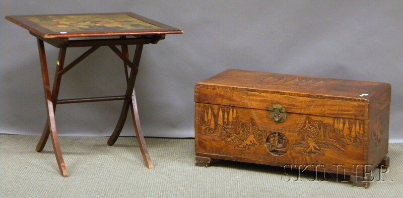 Chinese Carved Camphorwood Storage Box and a Fold: Chinese Carved Camphorwood Storage Box and a Folding Card Table, the box Victoria, Hong Kong, with interior tray, ht. 16 3/4, wd. 34 in.