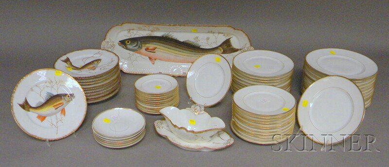Haviland Limoges Porcelain Fish Set and a Limoges: Haviland Limoges Porcelain Fish Set and a Limoges Partial Dinner Service, twelve transfer and hand-decorated plates, a platter, and sauceboat with underplate; and a fifty-two-piece Bernardaud & Co. Li