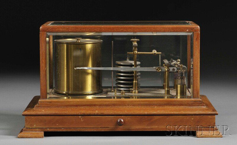 F.G. Schmidt Barograph, New York, the mahogany and: F.G. Schmidt Barograph, New York, the mahogany and beveled glass cased instrument with lacquered brass drum, aneroid barometer, pen, maker's plate and lower drawer with instructions for the barograph