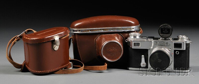 Russian Kiev 35mm Range Finder Camera and Lens, ch: Russian Kiev 35mm Range Finder Camera and Lens, chrome and black body, 50mm FII lens, and a view finder.