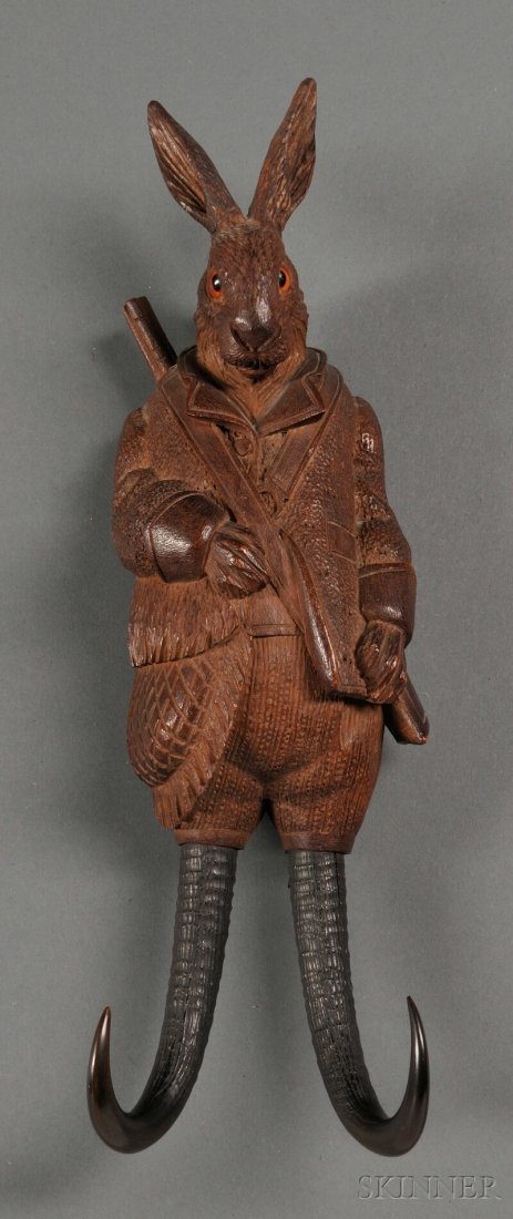 Black Forest Musical Buggy Whip Holder, Germany,: Black Forest Musical Buggy Whip Holder, Germany, c. 1870, in the form of a rabbit dressed for the hunt with gun and overcoat, key-wound musical box activated by hanging the whip on the holder playing 