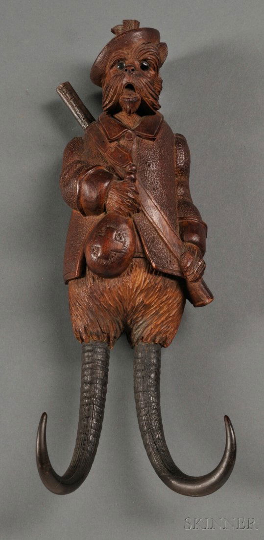 Black Forest Musical Buggy Whip Holder, Germany,: Black Forest Musical Buggy Whip Holder, Germany, c. 1870, in the form of a Scotty dog dressed for the hunt with gun, overcoat and cap, internal key-wound musical box activated by hanging the whip on t